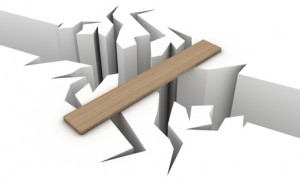 Board spanning crack in ground