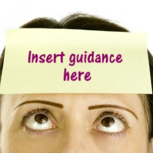 Woman with 'Insert guidance here' sticky note on forehead
