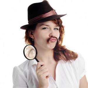 woman with mustache and magnifying glass