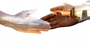 two hands representing different idea approaching each other to shake