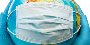 globe covered by a white mask