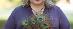 Christina with peacock feathers