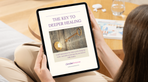 woman reading The Key to Deeper Healing on her tablet