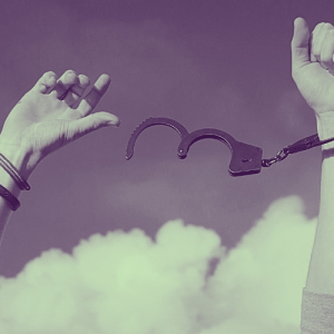 hands being freed from handcuffs