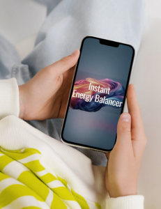 closeup of phone displaying Instant Energy Balancer artwork, being held by unseen person