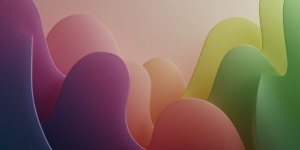 curved shapes in multiple colors that vaguely resemble figures standing in an unstructured group