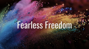 Fearless Freedom logo (text over multicolor explosion of powdered paint)