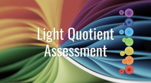 Light Quotient Assessment logo: text over abstract colorful background created by close-up view of papers in a rainbow array of colors